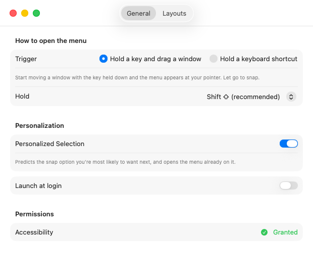 The General tab of Window Organizer Settings. The trigger is set to 'Hold a key and drag a window' with the hold key set to Shift. A 'Personalization' section has a 'Personalized Selection' switch turned on, described as predicting the snap option you're most likely to want next and opening the menu already on it. Below are a 'Launch at login' switch and a Permissions row showing Accessibility as Granted.